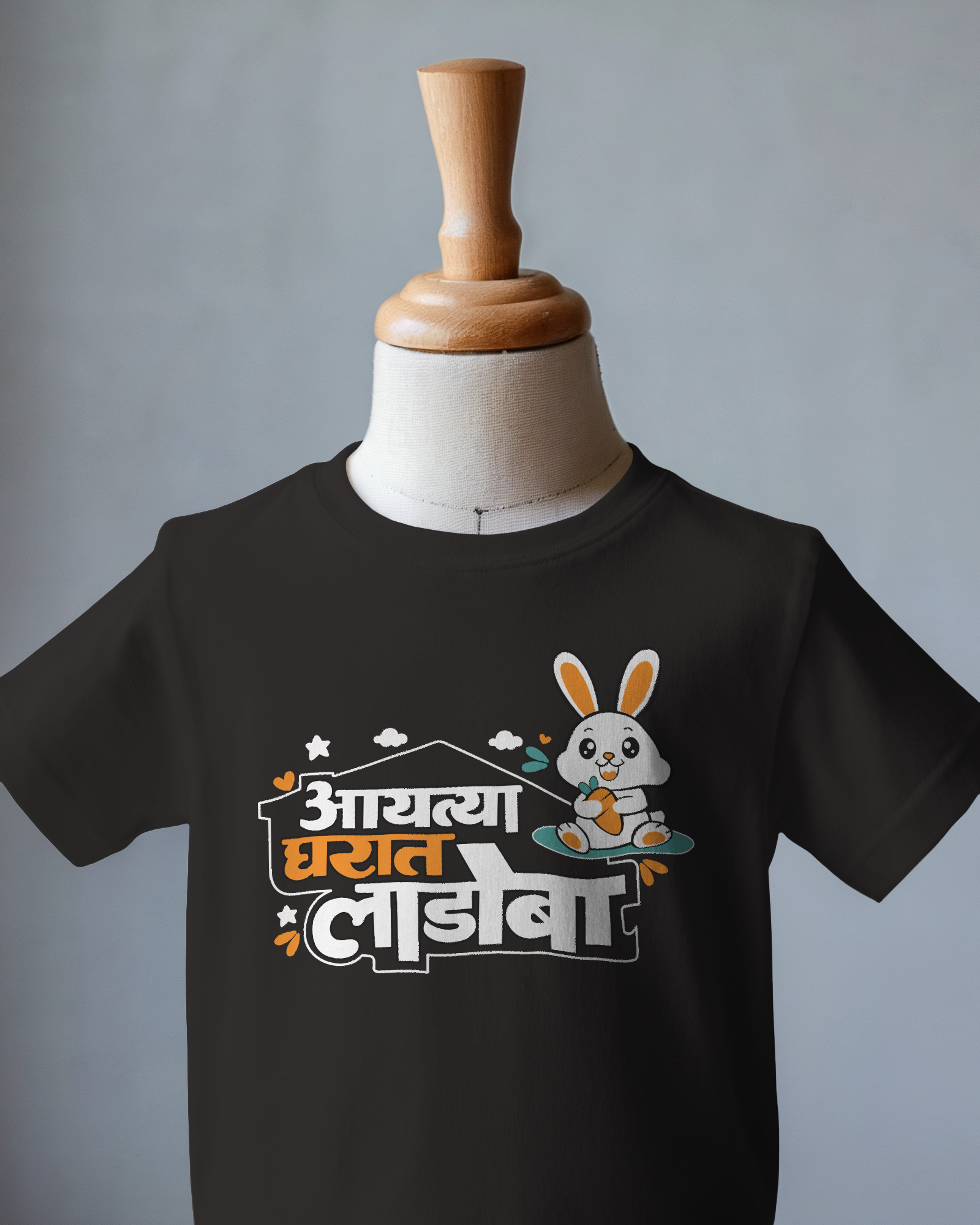 minimalist-kid-t-shirt-mockup-on-wooden-mannequin-against-soft-gray-background-simple-and-elegant-presentation-0003